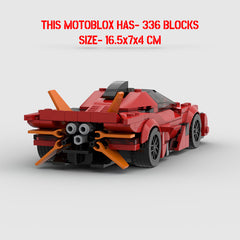 Red and black toy car made of interlocking blocks on a white background with text about block count and size.